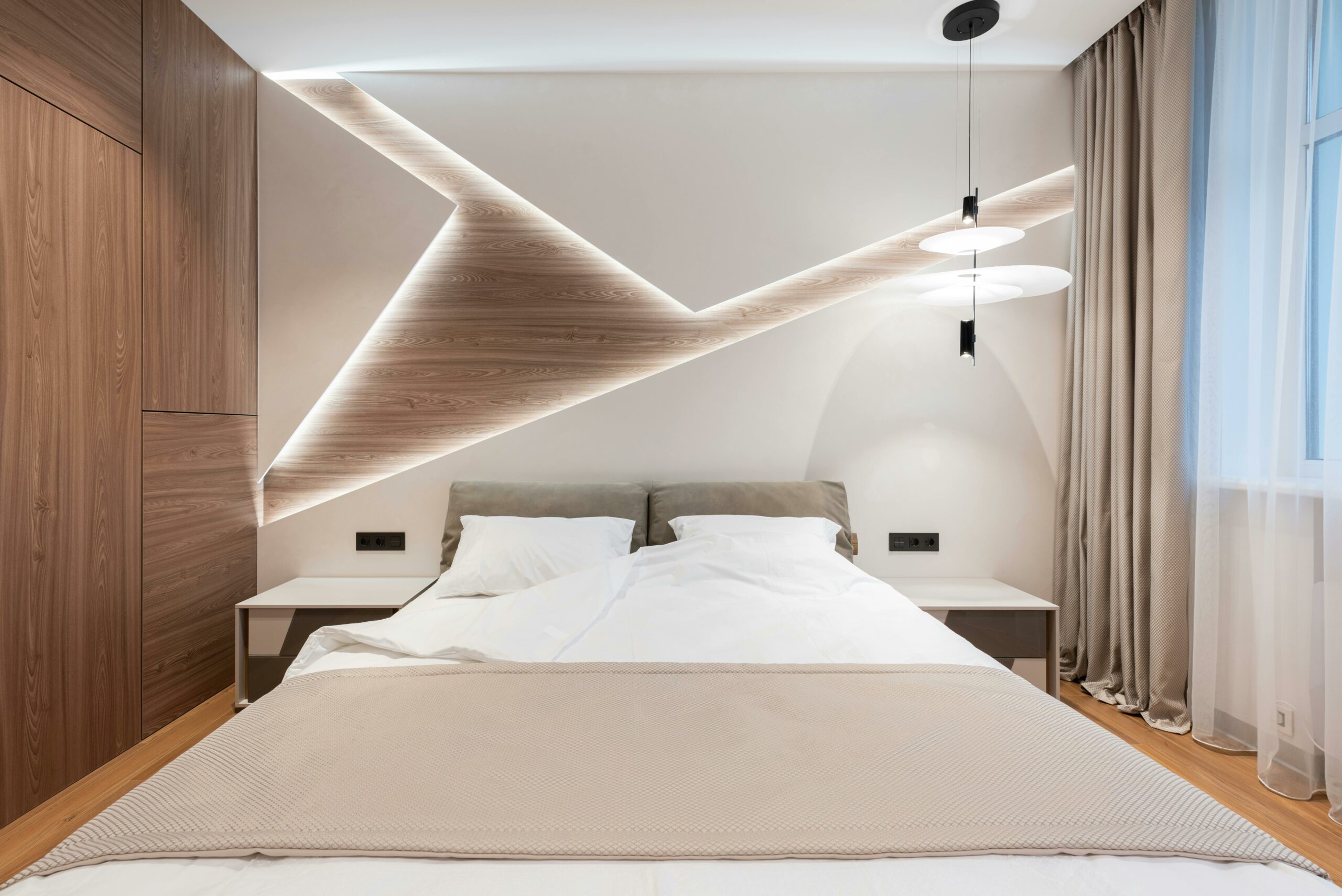 a-bed-with-a-light-on-the-wall